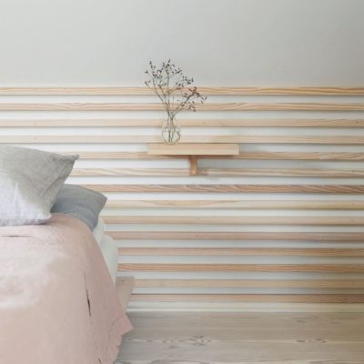 Come decorare la parete dietro il letto in stile minimal